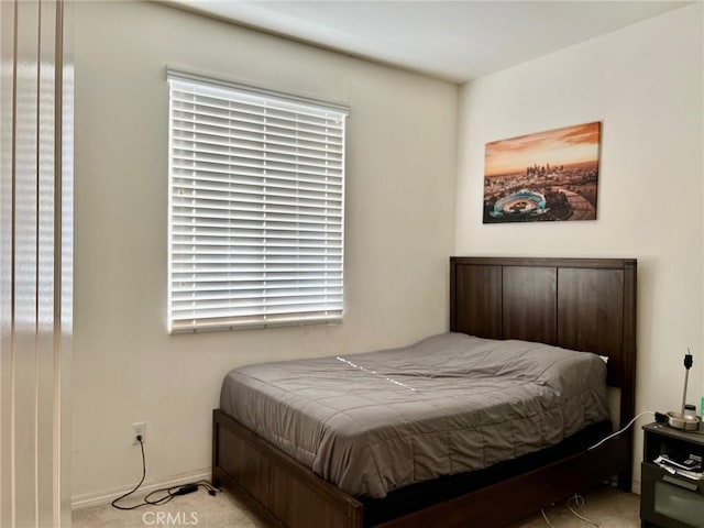 3204 E Denali Dr, Ontario, CA 91762 - bedroom with baseboards and light colored carpet