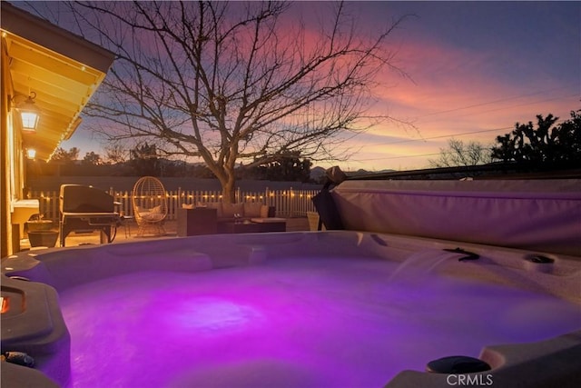56838 Bonanza Dr, Yucca Valley, CA 92284 - pool at dusk with a hot tub