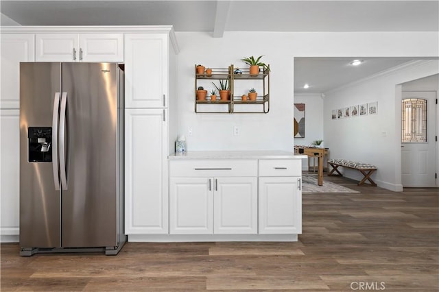 56838 Bonanza Dr, Yucca Valley, CA 92284 - kitchen with stainless steel refrigerator with ice dispenser, white cabinets, dark wood-style floors, recessed lighting, and ornamental molding