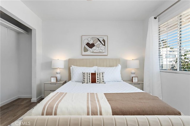 56838 Bonanza Dr, Yucca Valley, CA 92284 - bedroom featuring wood finished floors and baseboards