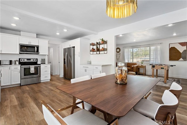 56838 Bonanza Dr, Yucca Valley, CA 92284 - dining space with wood finished floors and recessed lighting