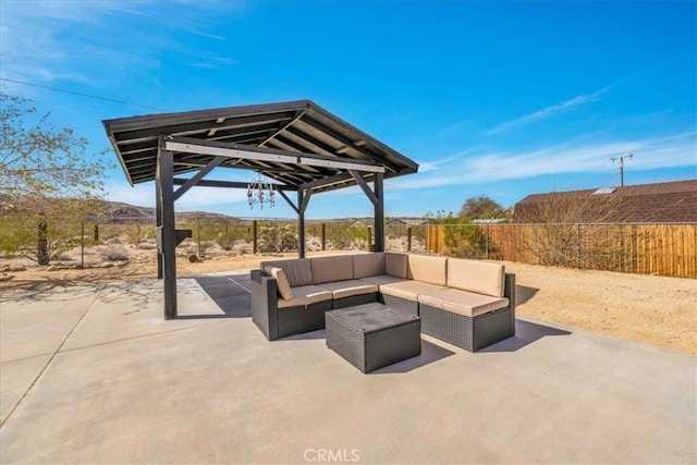 view of patio featuring a fenced backyard and outdoor lounge area