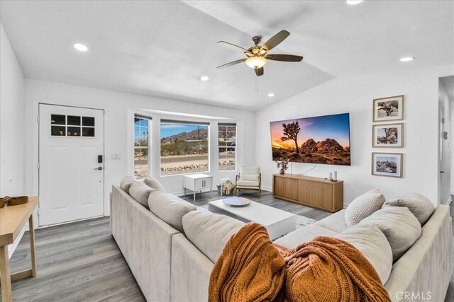 7068 Eucalyptus Ave Unit 29, Palms, CA 92277 - living area featuring vaulted ceiling, ceiling fan, recessed lighting, and light wood-style floors