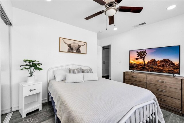 7068 Eucalyptus Ave Unit 29, Palms, CA 92277 - bedroom featuring dark wood-style flooring, recessed lighting, and a ceiling fan