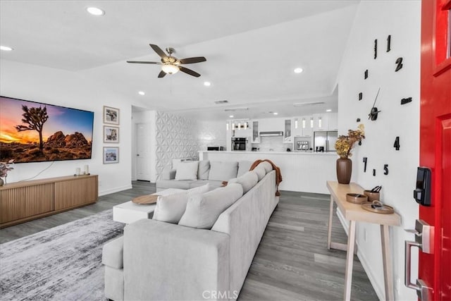 7068 Eucalyptus Ave Unit 29, Palms, CA 92277 - living room featuring wood finished floors, a ceiling fan, lofted ceiling, recessed lighting, and baseboards
