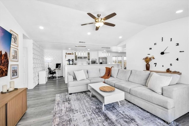 7068 Eucalyptus Ave Unit 29, Palms, CA 92277 - living room featuring ceiling fan, light wood finished floors, recessed lighting, lofted ceiling, and an office area