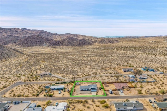 bird's eye view featuring a mountain view and a desert view