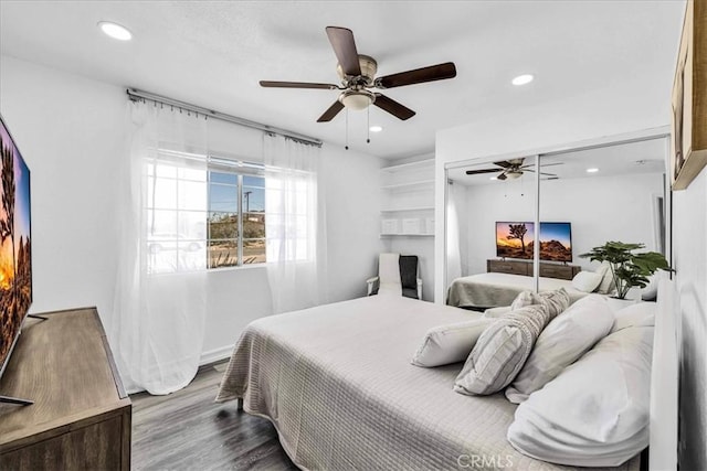 bedroom with recessed lighting, wood finished floors, and ceiling fan