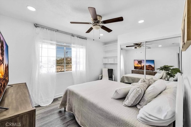 7068 Eucalyptus Ave Unit 29, Palms, CA 92277 - bedroom featuring recessed lighting, wood finished floors, and a ceiling fan