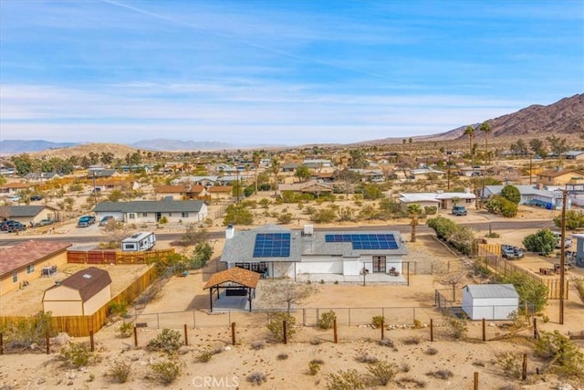 drone / aerial view with a mountain view and a desert view