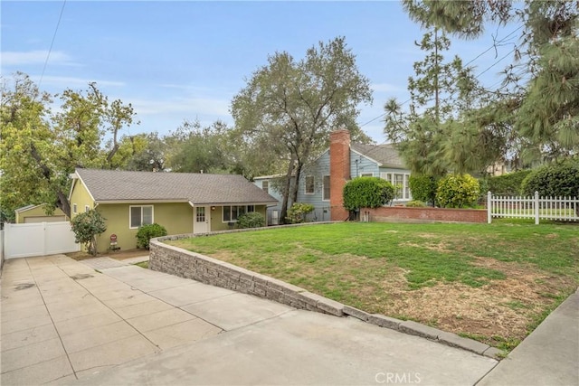 single story home featuring a gate, stucco siding, a front lawn, and fence