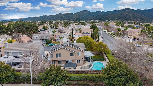 bird's eye view with a mountain view and a residential view