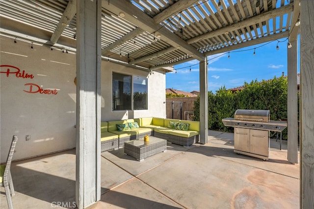 view of patio featuring grilling area, fence, a pergola, and an outdoor hangout area