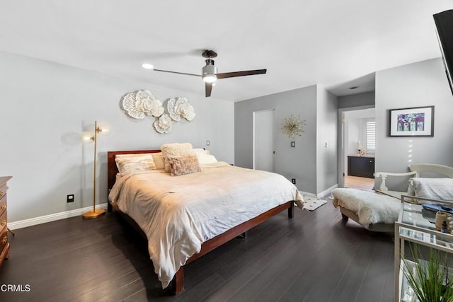 bedroom featuring dark wood-style floors, ceiling fan, and baseboards