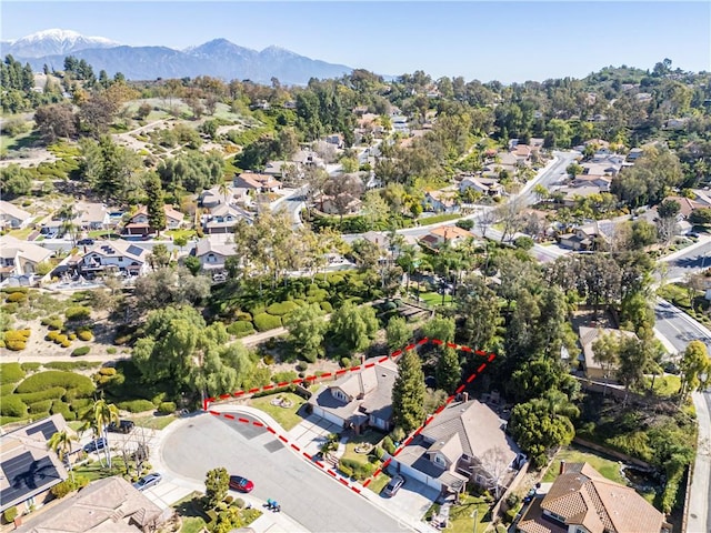 aerial view with a mountain view and a residential view