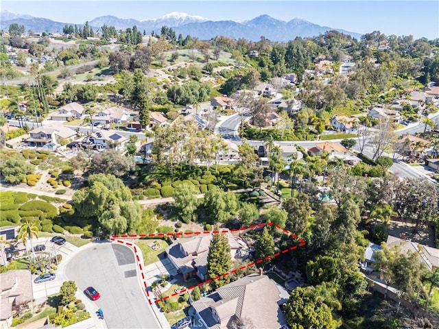 aerial view featuring a mountain view and a residential view