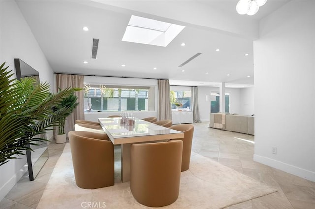 dining room with visible vents, recessed lighting, a skylight, and baseboards