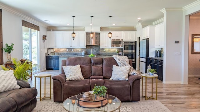 living area with crown molding, recessed lighting, baseboards, and light wood finished floors