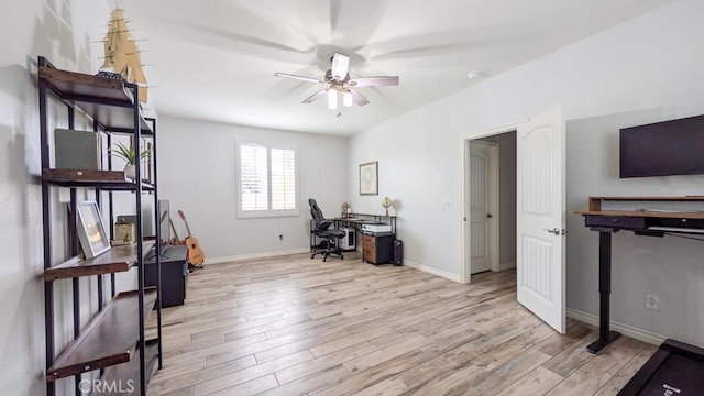 home office with light wood-type flooring, baseboards, and ceiling fan