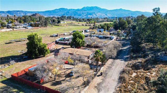 birds eye view of property featuring a mountain view