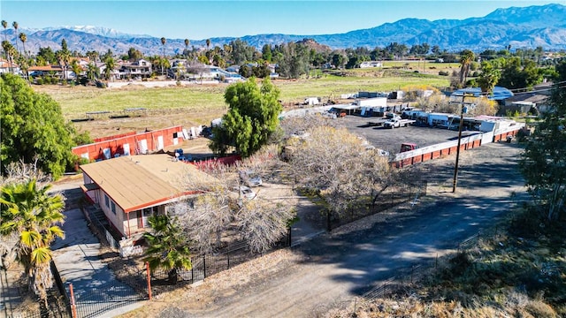 birds eye view of property featuring a mountain view