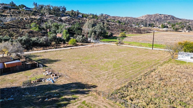 bird's eye view with a mountain view and a rural view