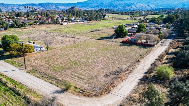 aerial view with a mountain view and a rural view