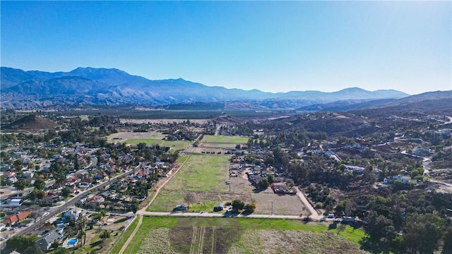 drone / aerial view featuring a mountain view