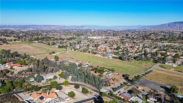 drone / aerial view with a residential view and a mountain view