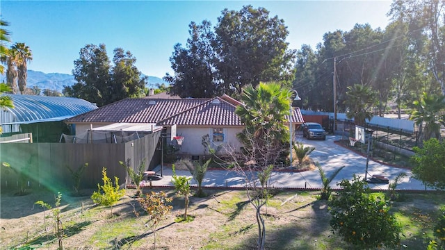 exterior space featuring a patio and fence