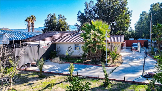 view of pool featuring a patio and fence