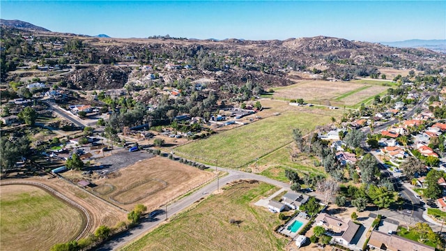 drone / aerial view featuring a mountain view