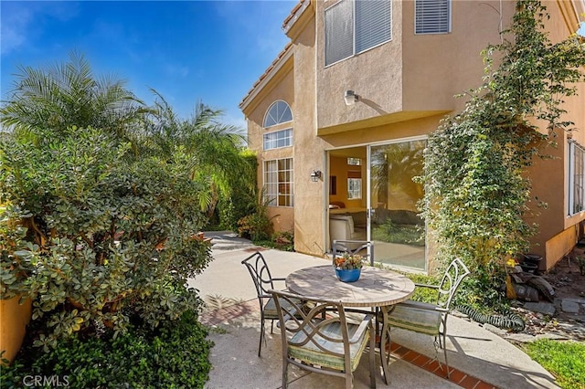 view of patio with outdoor dining area