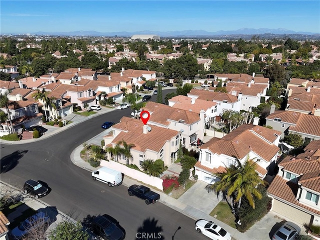 bird's eye view with a residential view and a mountain view