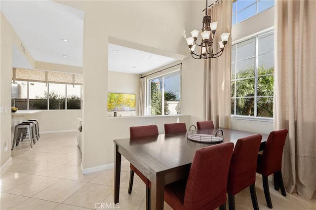 tiled dining room with recessed lighting, visible vents, baseboards, and a chandelier