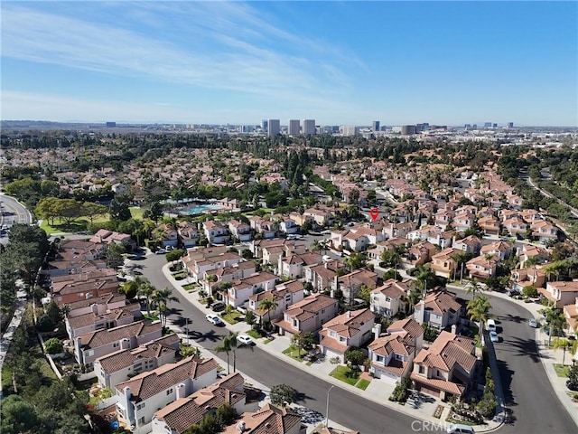 birds eye view of property with a residential view