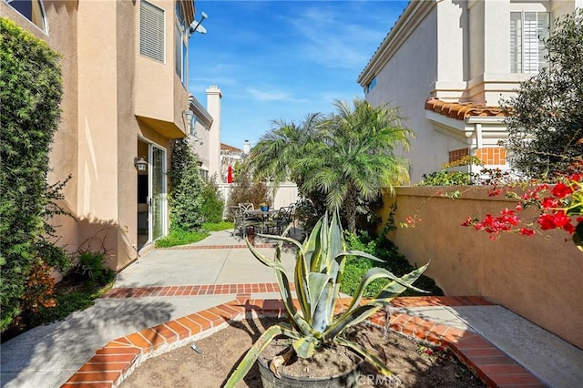 view of patio with fence