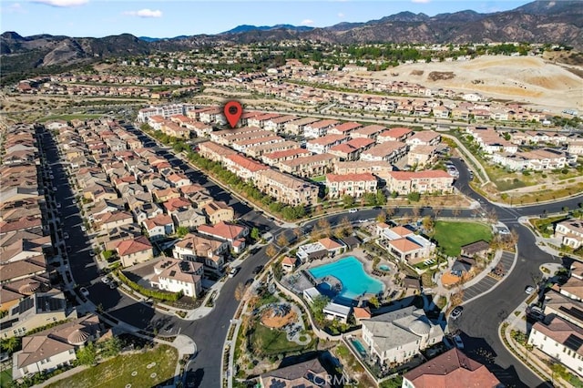 birds eye view of property with a residential view and a mountain view