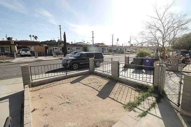 1111 Taos Dr, Barstow, CA 92311 - gate featuring a residential view