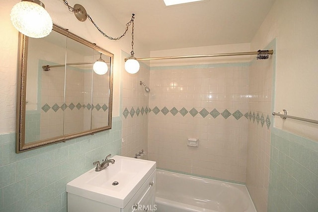 1111 Taos Dr, Barstow, CA 92311 - full bath featuring tile walls, shower / tub combination, and vanity