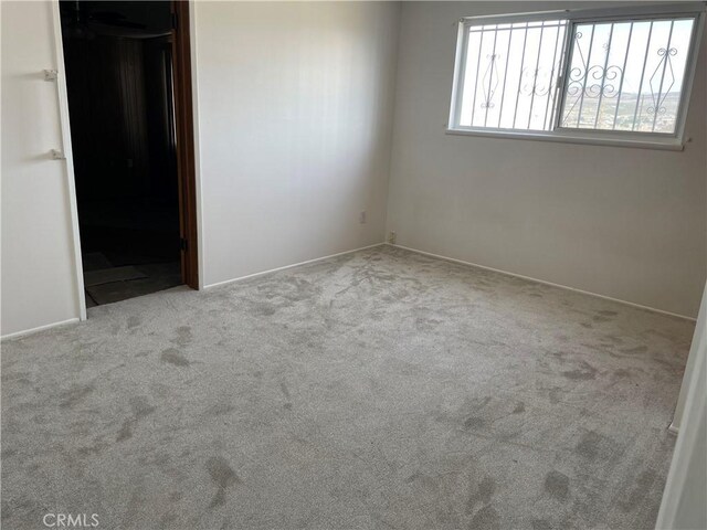 1111 Taos Dr, Barstow, CA 92311 - unfurnished bedroom with carpet and baseboards