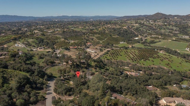 bird's eye view with a mountain view