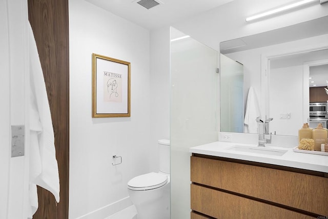 full bathroom featuring visible vents, toilet, and vanity
