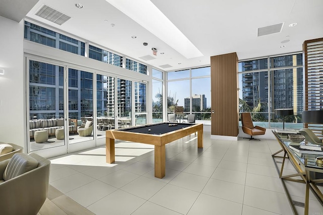 game room with floor to ceiling windows, tile patterned flooring, billiards, and visible vents
