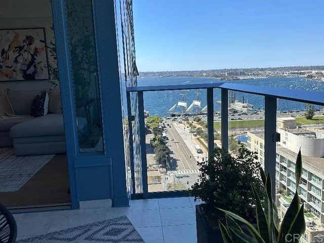 balcony featuring a water view