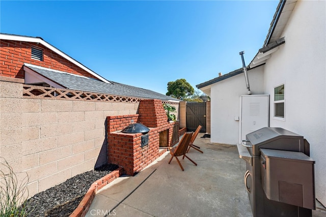 view of patio / terrace with fence