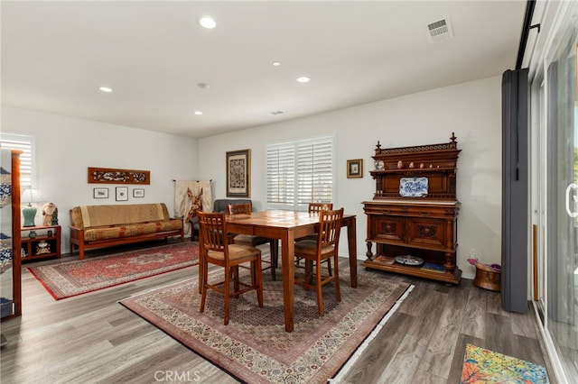 dining room with recessed lighting, wood finished floors, and visible vents