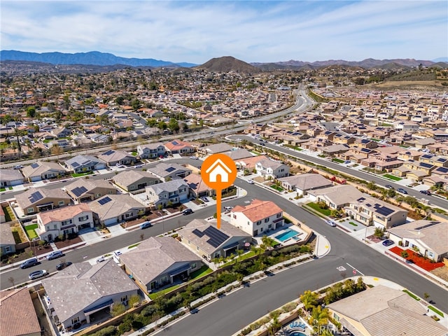 drone / aerial view with a residential view and a mountain view