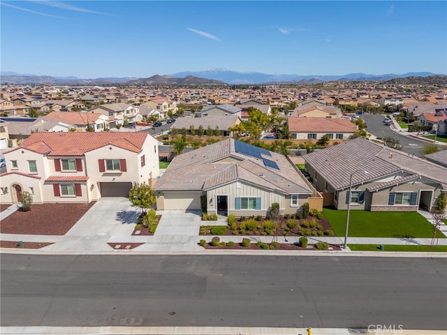 birds eye view of property featuring a residential view and a mountain view