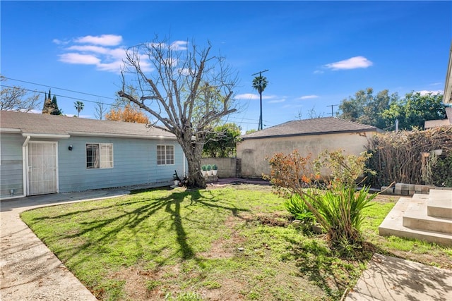 view of yard with fence